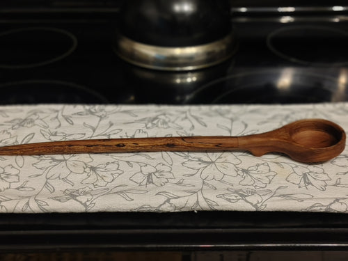 Hand-carved wooden measuring spoon